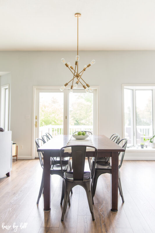 Renovated Open Concept Home Eating Area with Modern Chandelier.