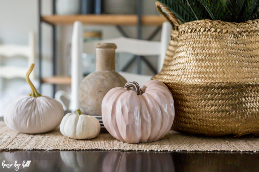 Up close picture of the seagrass basket and pumpkins.