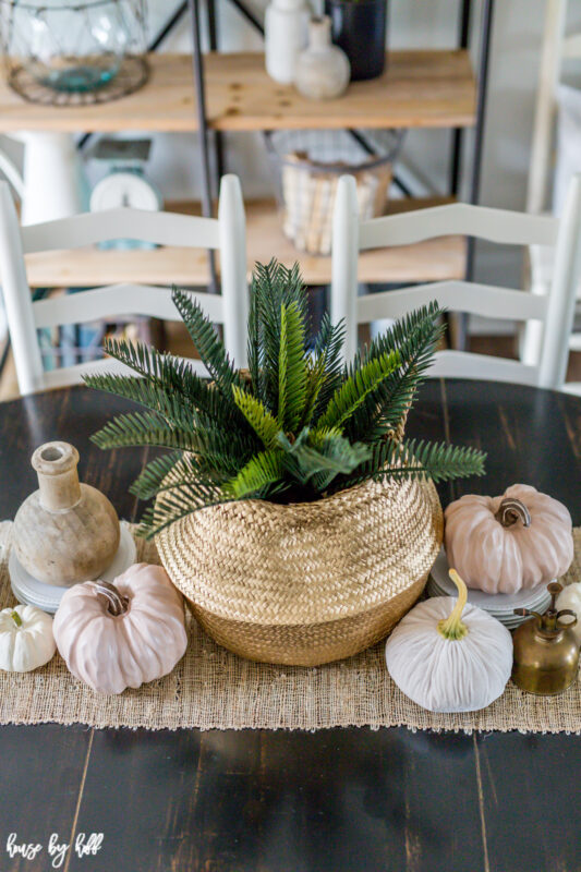 Woven Basket Centerpiece with Fall Decorations.