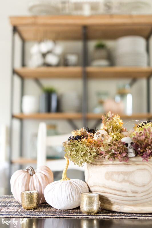 Velvet Pumpkins and Wood Bowl beside the Halloween centerpiece.