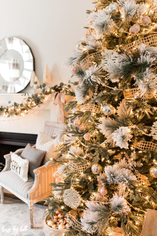 Christmas Tree with Flocked Branches and Rose Gold Ornaments