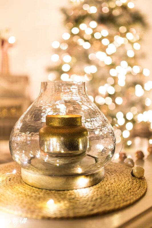 A gold candle is on the table.