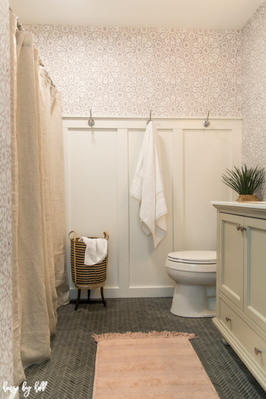 Bathroom Remodel with Wallpaper, Herringbone Floor, and Board and Batten