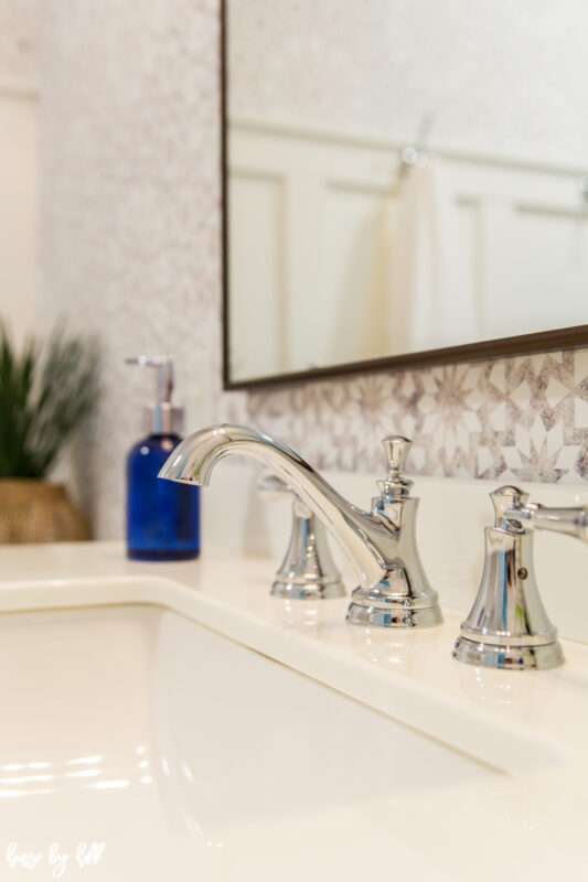 White Marble Bathroom Counter Tops and Chrome Hardware