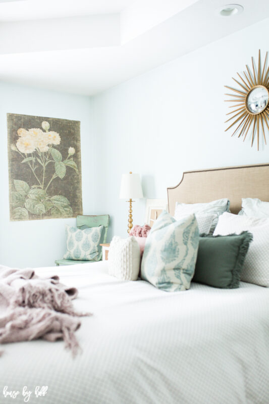 Master bedroom with large scale floral art on decorative paper from Walmart