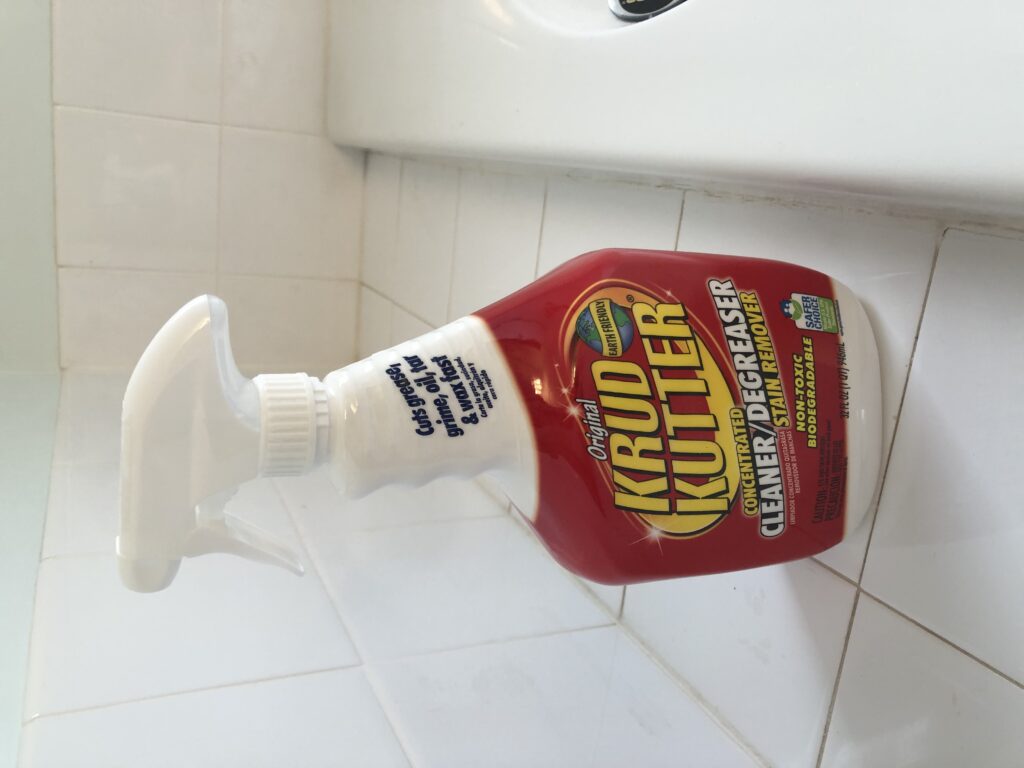 Use Krud Kutter to clean tiles and linoleum before painting