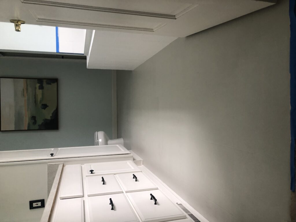 Linoleum bathroom floors after one coat of paint