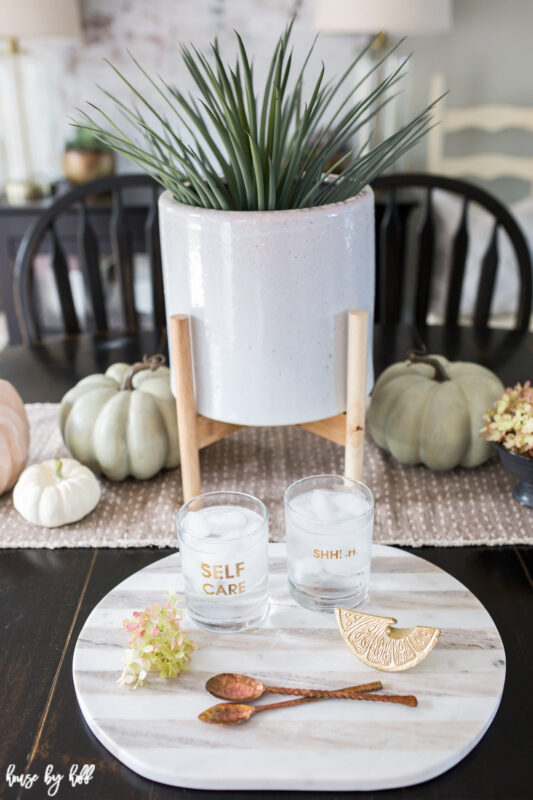 White footed planter on dining table