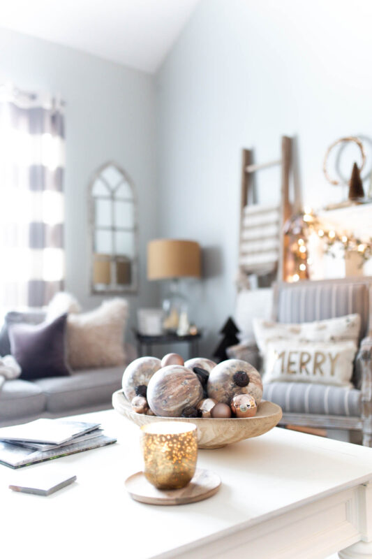 White Coffee Table with Acacia Wood Bowl filled with Ornaments