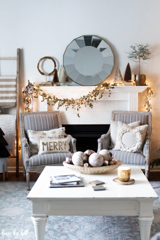 Elegant Holiday Living Room with Asymmetrical Mantel Garland 