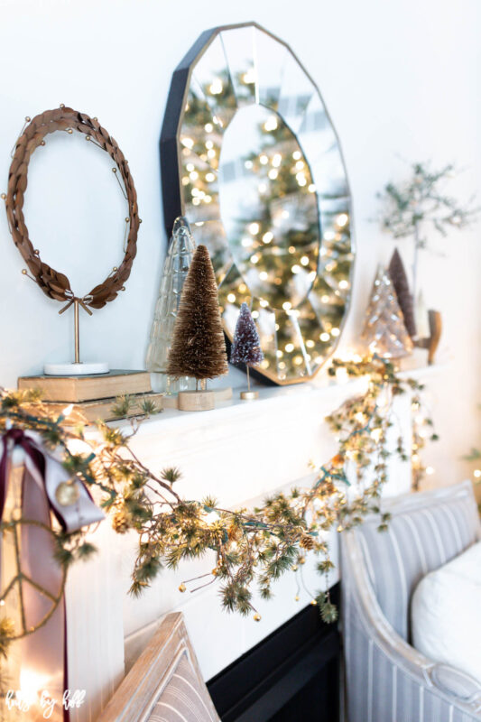 Elegant Holiday Living Room with Asymmetrical Mantel Garland 