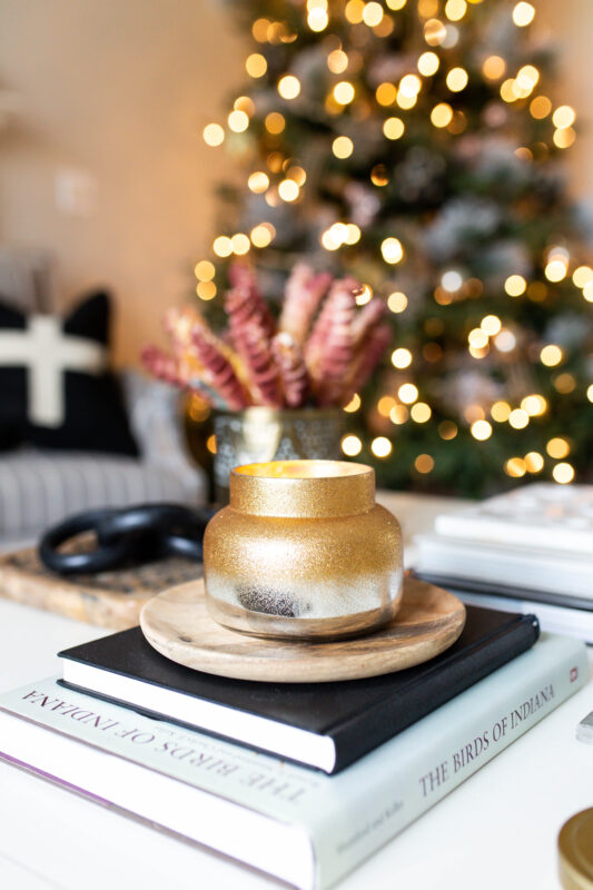 Gold Candle on Coffee Table Books