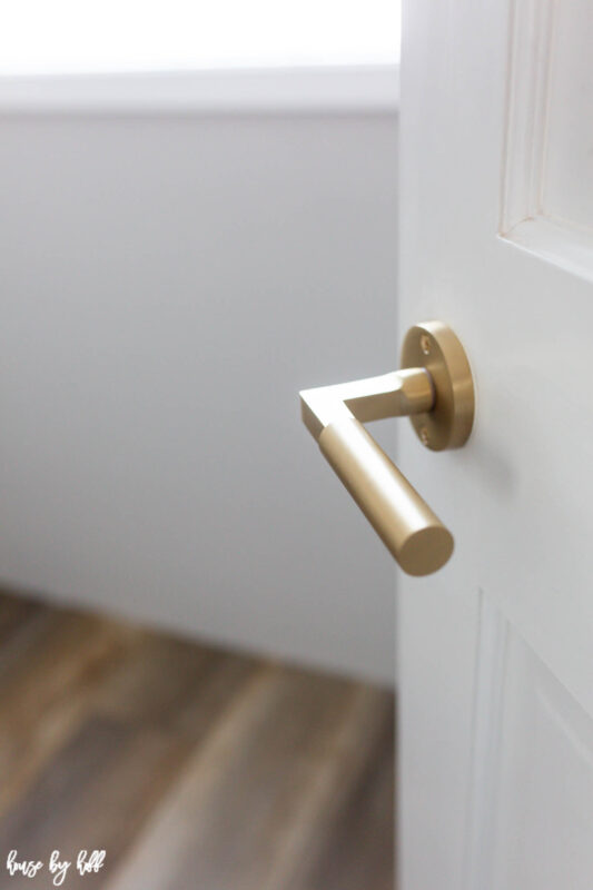 Brass Doorknob on White Door